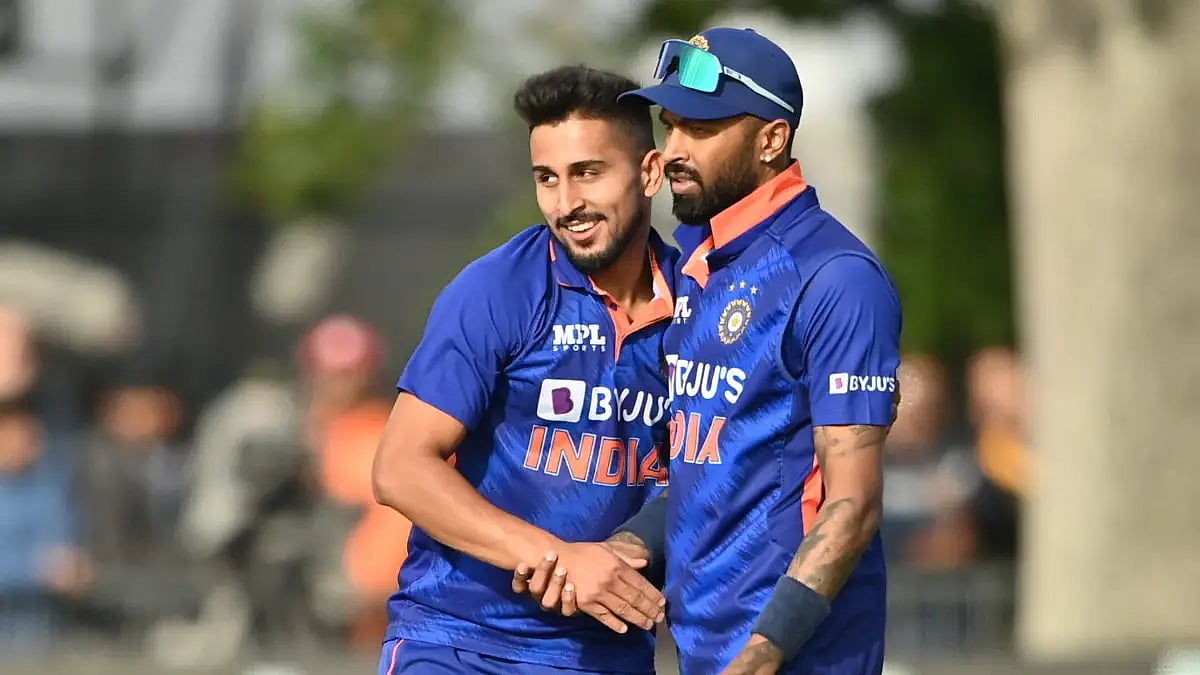 Umran Malik celebrates with Hardik Pandya after taking a Ireland wicket in the second T20.  