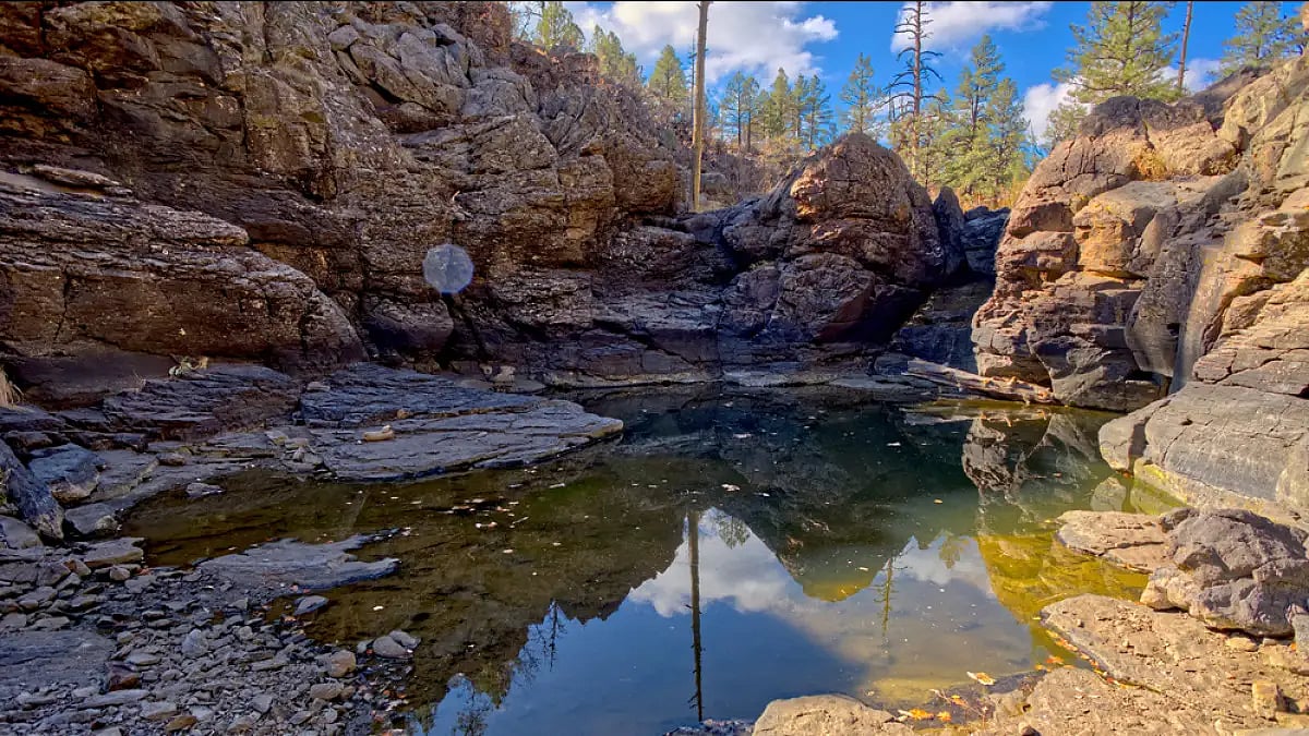 Keyhole Sink contains fresh water in an arid region from an unknown source