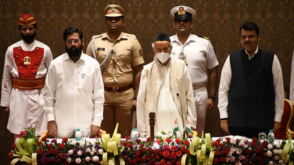 Governor Bhagat Singh Koshari administering the oath of office to Eknath Shinde and Deputy Chief Min