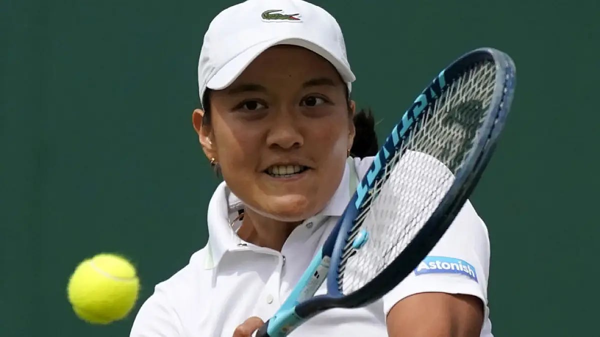France's Harmony Tan returns to Britain's Katie Boulter during their Wimbledon 2022, third round match.