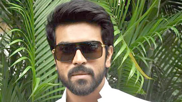 Candid Video Of Ram Charan Flaunting His New Hairstyle Goes Viral