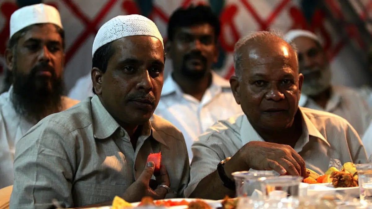 Wakar Khan and R Ramchandra (Bhau) Khorde, who set up the Dharavi mohalla committee