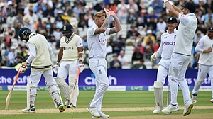 England players celebrate the dismissal of India's Mohammed Shami on Day 4 of the fifth Test.