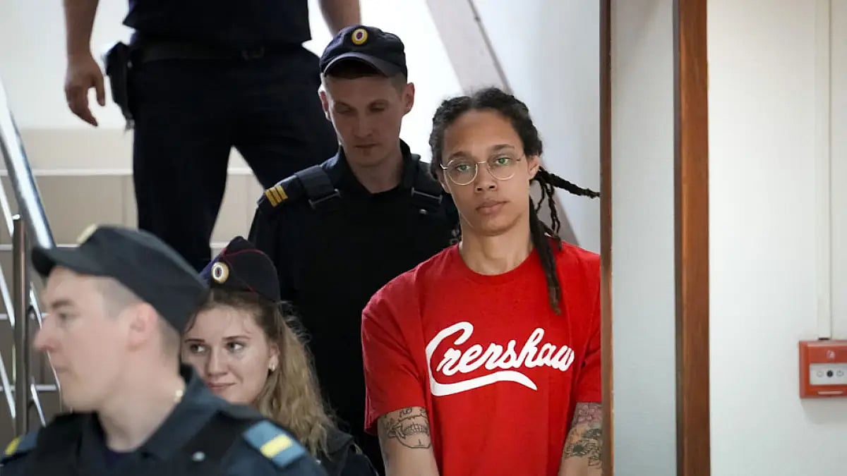 Brittney Griner is escorted to a courtroom for a hearing, in Khimki outside Moscow, July 7, 2022.