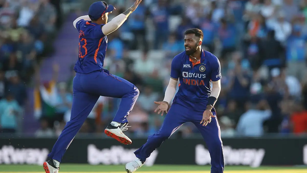 Hardik Pandya (R) celebrates one of his four wickets against England in the 1st T20 on Thursday.  