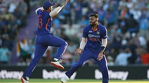 Hardik Pandya (R) celebrates one of his four wickets against England in the 1st T20 on Thursday.