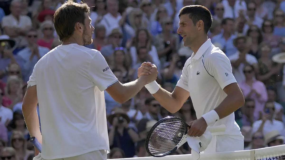 Novak Djokovic, right, greets Cameron Norrie after their Wimbledon 2022 semi-final match.