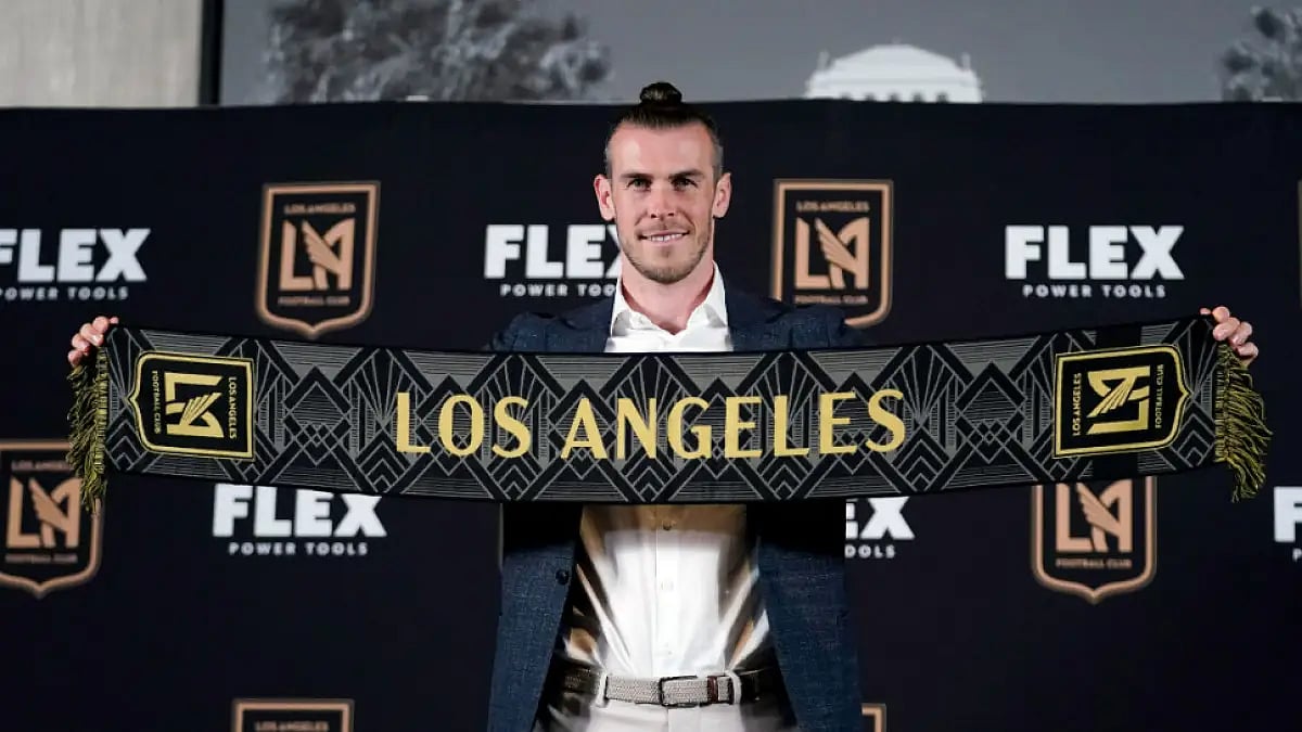 Gareth Bale poses for photos after being introduced as a new member of the Los Angeles FC.