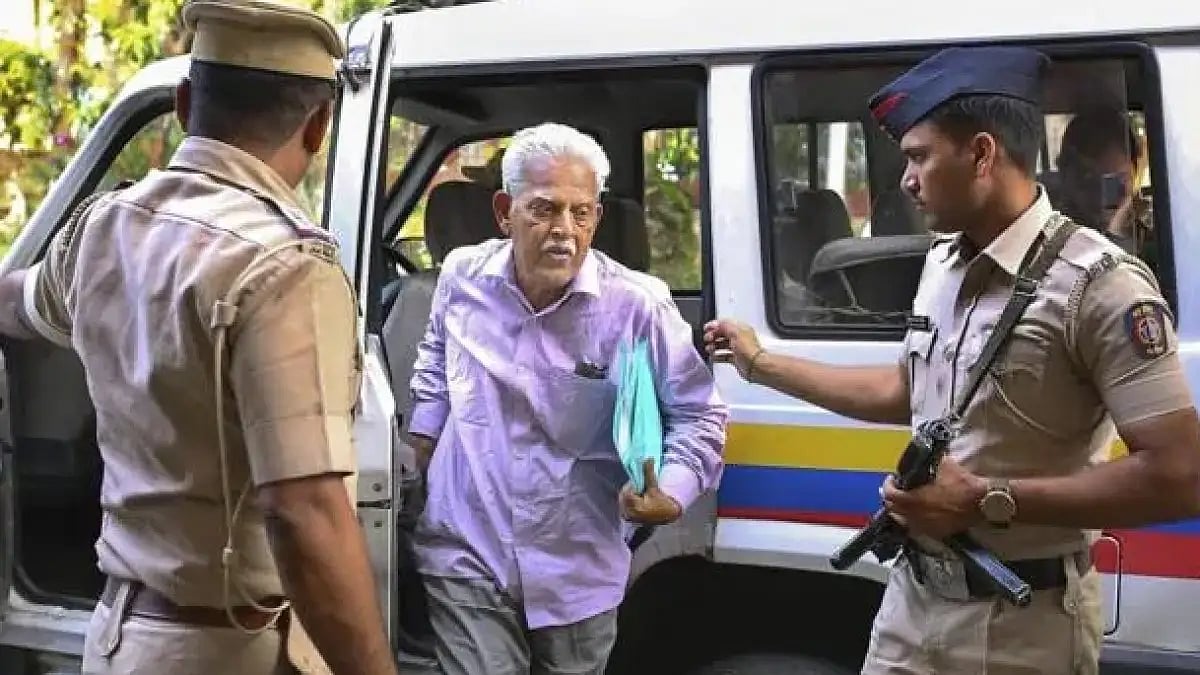 Activist, writer and poet P Varavara Rao (Center)