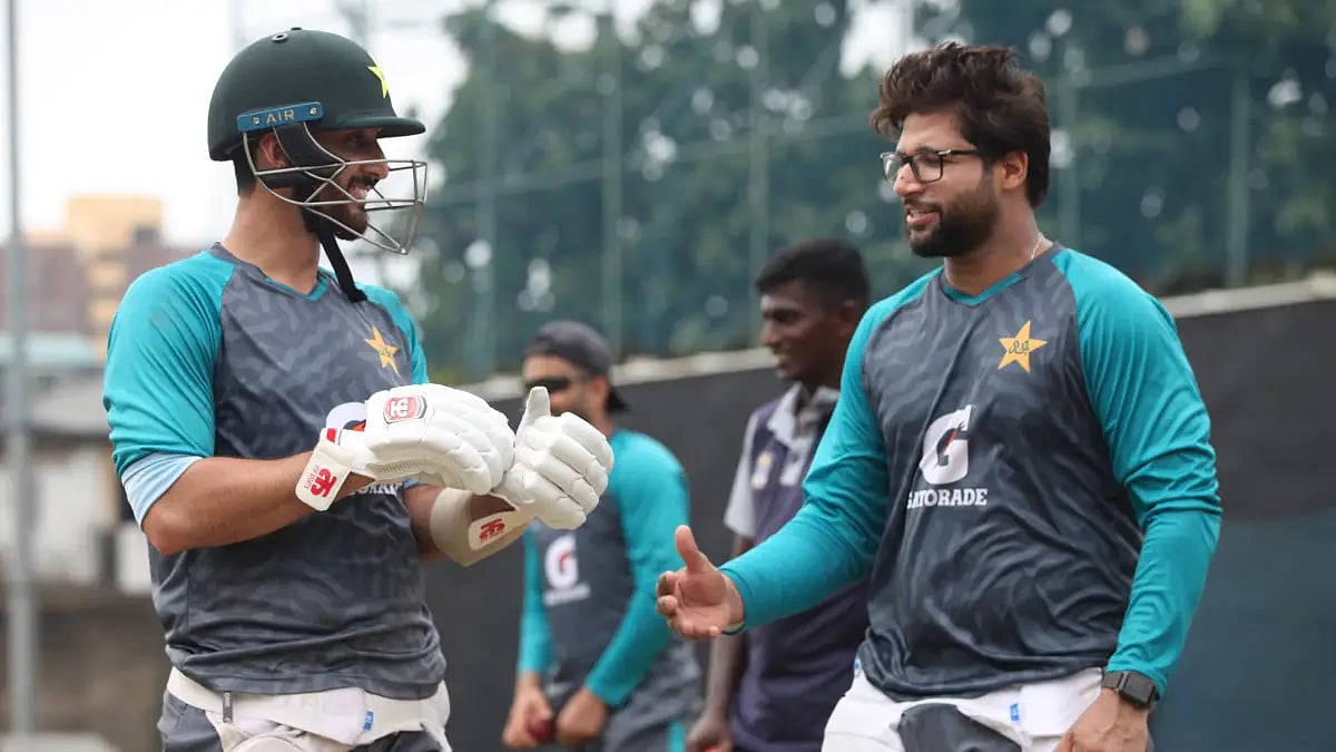 Pakistan players share a light moment during their training session in Colombo.  