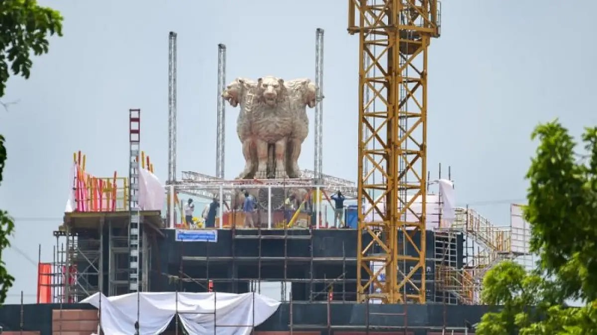 The new National Emblem atop new Parliament building.