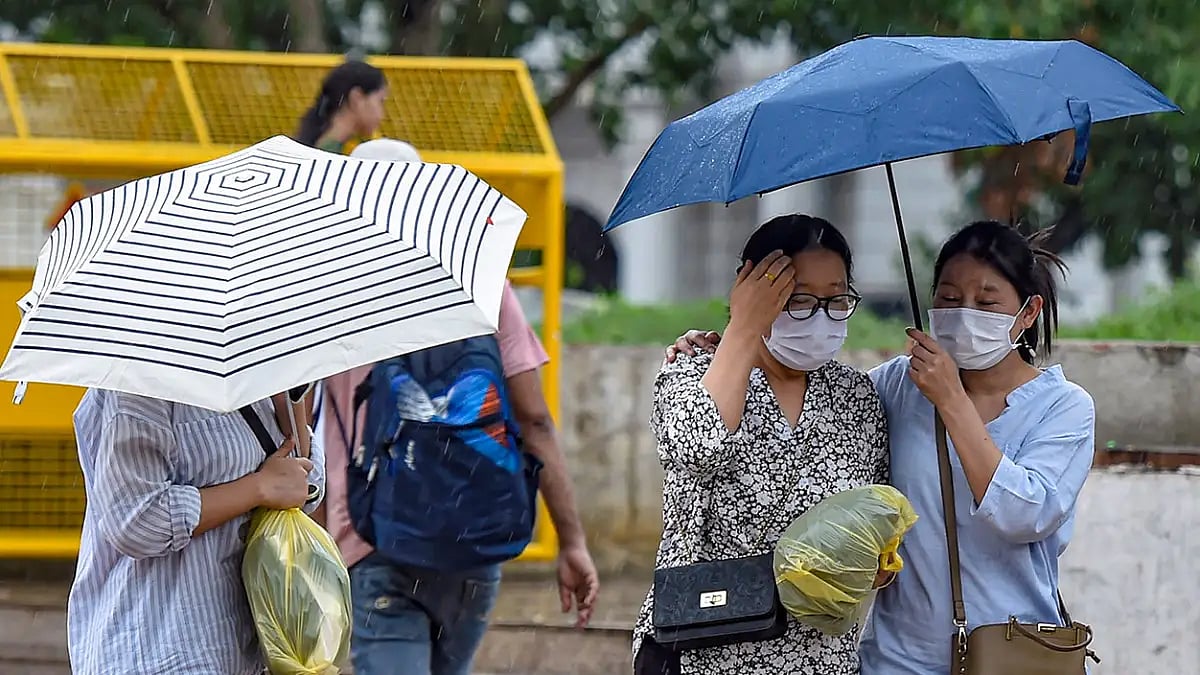Weather: Rain in Delhi - null