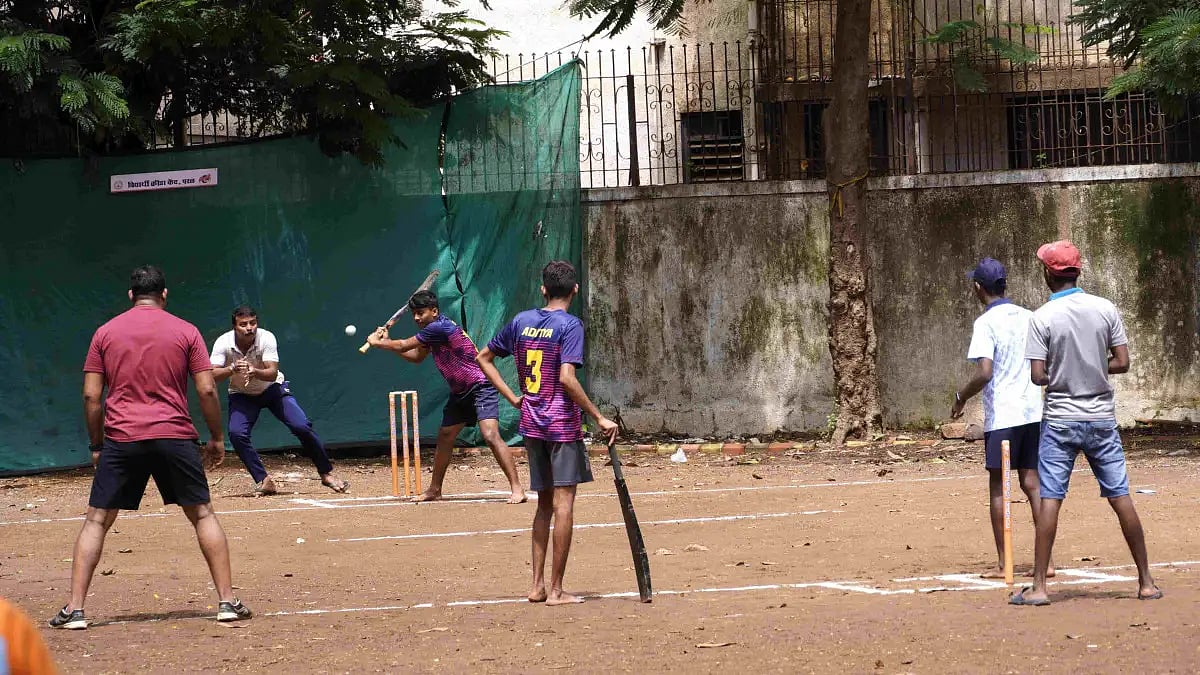 A game of cricket at Lal Maidan in Mumbai's Parel.