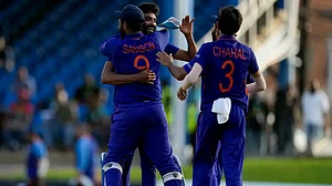 Teammates embrace Mohammed Siraj after India defeated West Indies by three runs in first ODI.