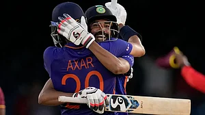 Axar Patel and Mohammed Siraj celebrates after India's win over West Indies in the second ODI.