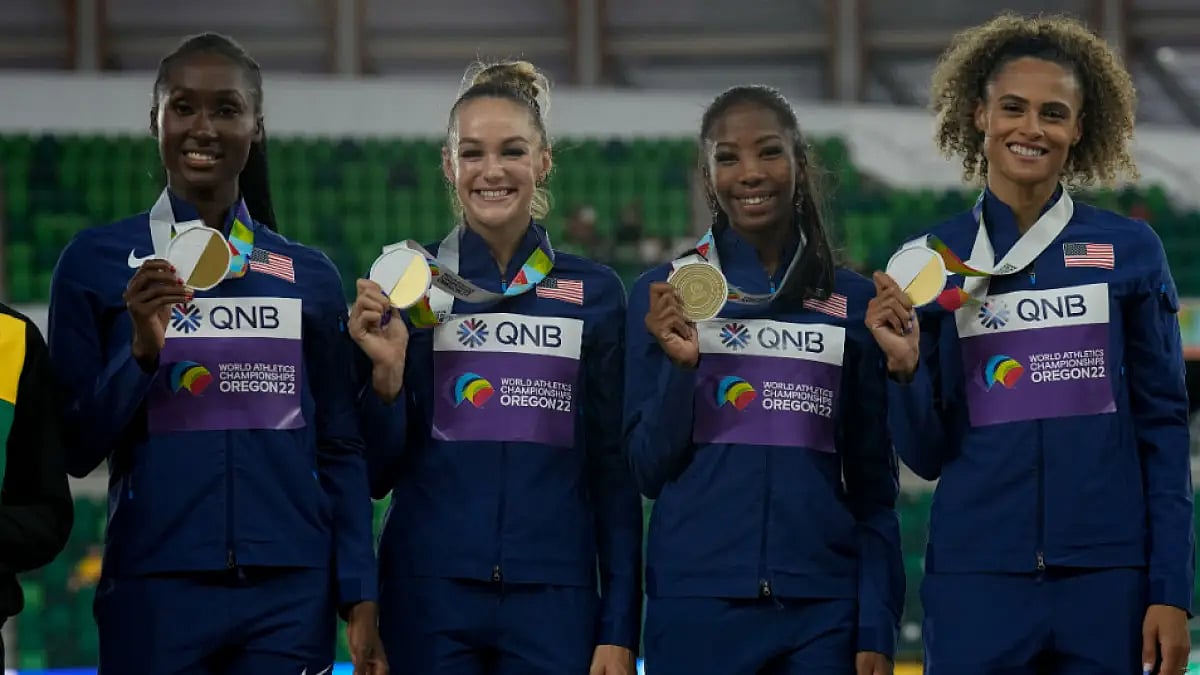 Team USA pose with women's 4x400m relay  gold at the World Athletics Championships 2022.
