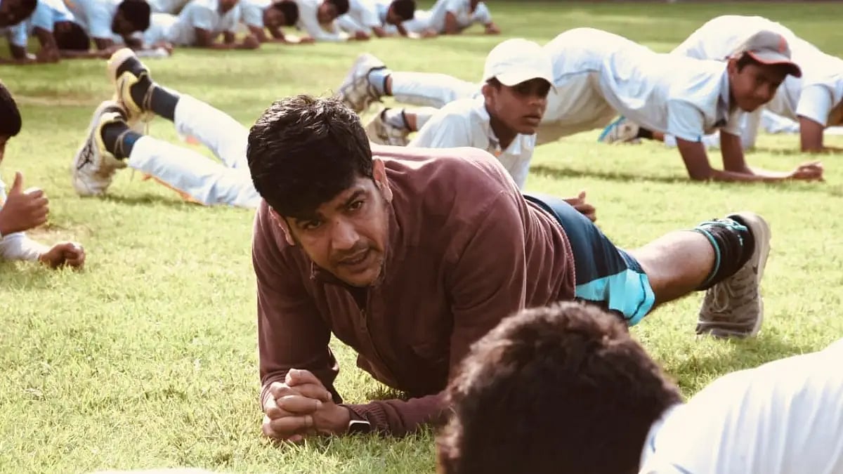 Laxmi Ratan Shukla discusses a point with young talents during a training session. 