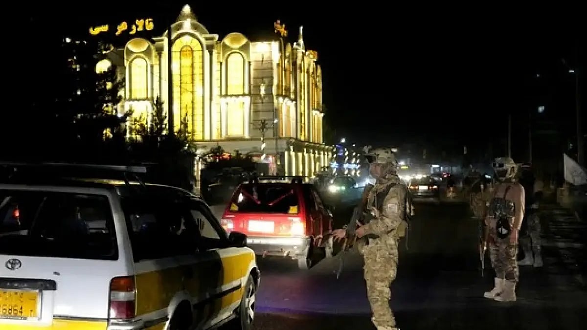 Taliban fighters at the Kabul International Cricket Stadium