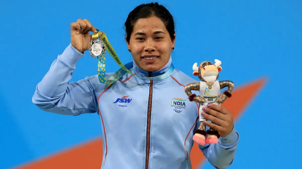 India's Bindyarani Devi celebrates with women's 55kg weightlifting silver at CWG 2022.