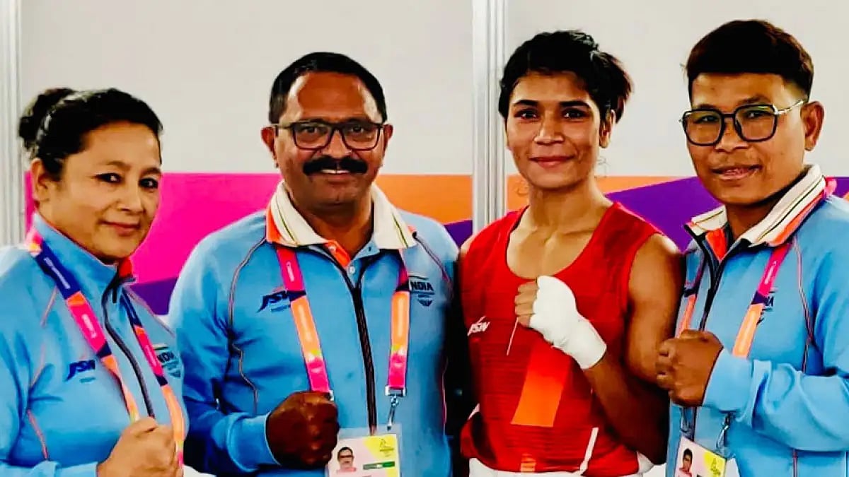 India's Nikhat Zareen with the coaching staff after her win against Helena Ismael Bagao of Mozambique.