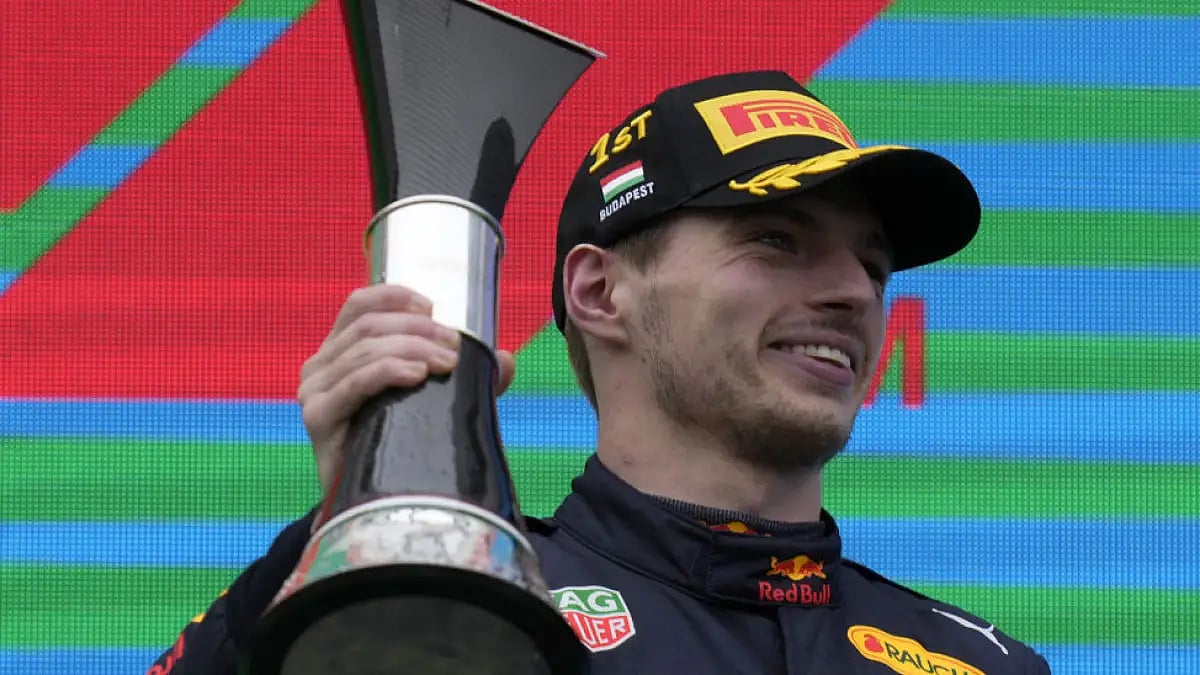 Red Bull driver Max Verstappen on the podium after winning the Hungarian Grand Prix 2022.