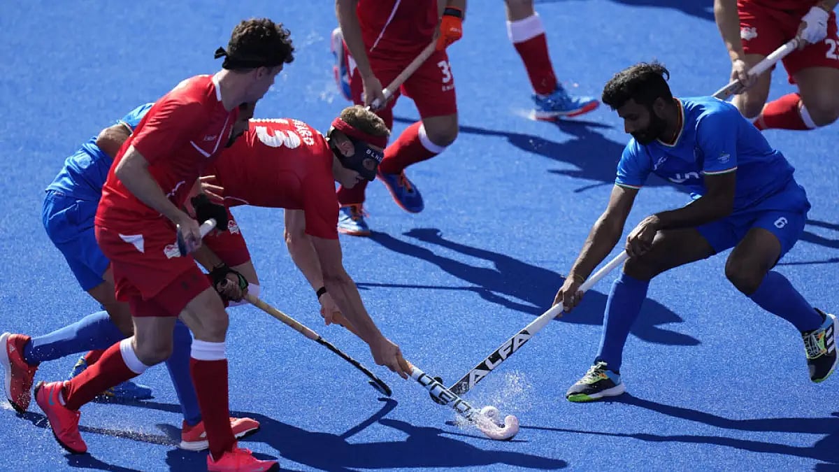 India and England played out a 4-4 draw in the men's hockey pool match.