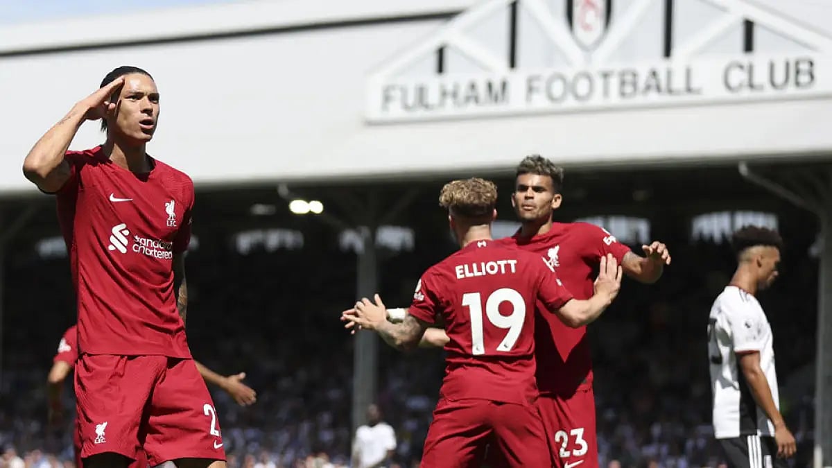 Liverpool's Darwin Nunez, right, celebrates a goal against Fulham during their EPL match.