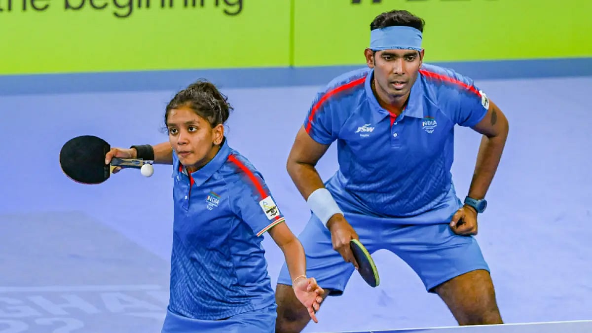 Achanta Sharath Kamal and Sreeja Akula in action during their mixed doubles semis at CWG 2022.