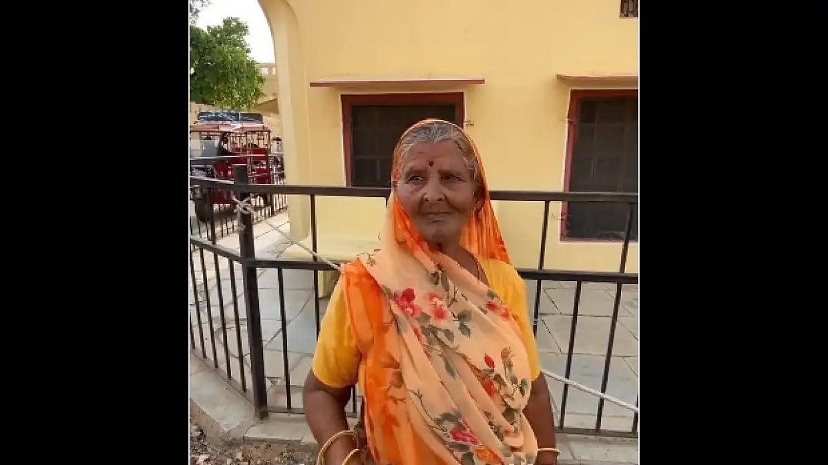 Elderly Jaipur woman selling papads.