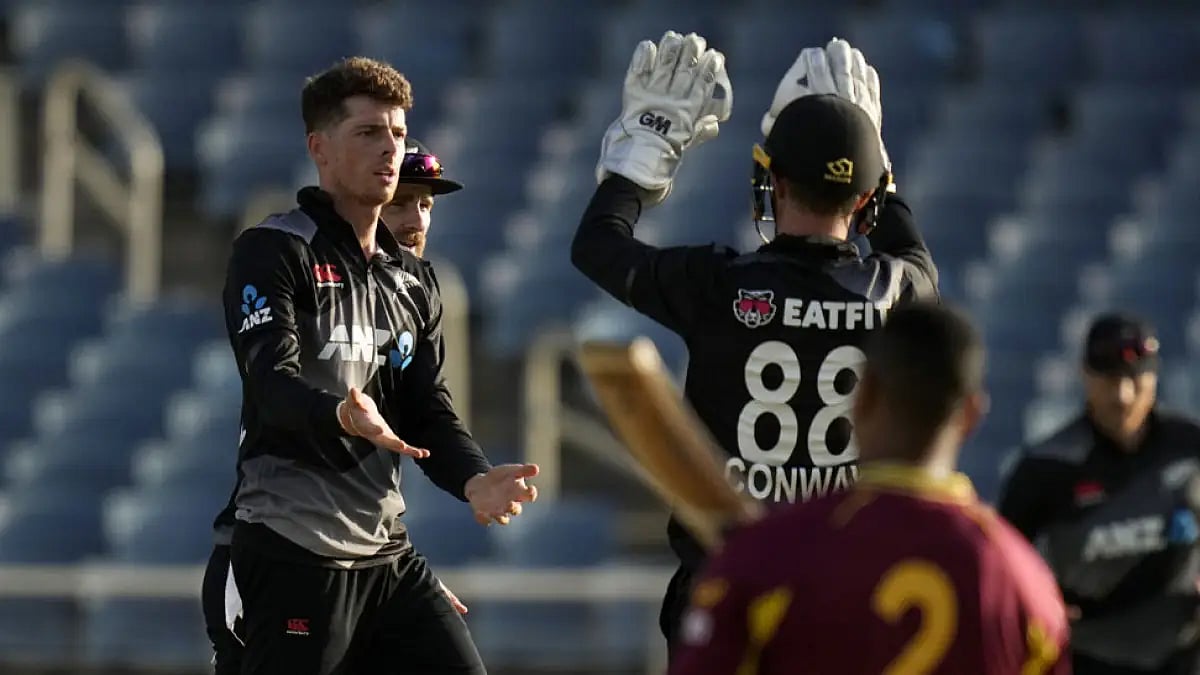 New Zealand's Mitchell Santner celebrates taking the wicket of West Indies' Shimron Hetmyer during t