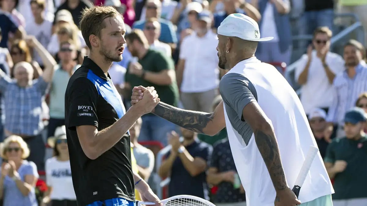 Daniil Medvedev, left, congratulates Nick Kyrgios after the end of their match at National Bank Open in Montreal.