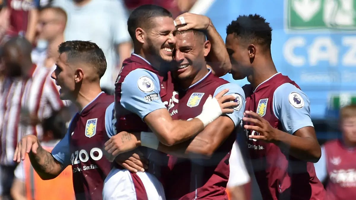 Aston Villa players celebrate a goal against Everton in English Premier League on Saturday.