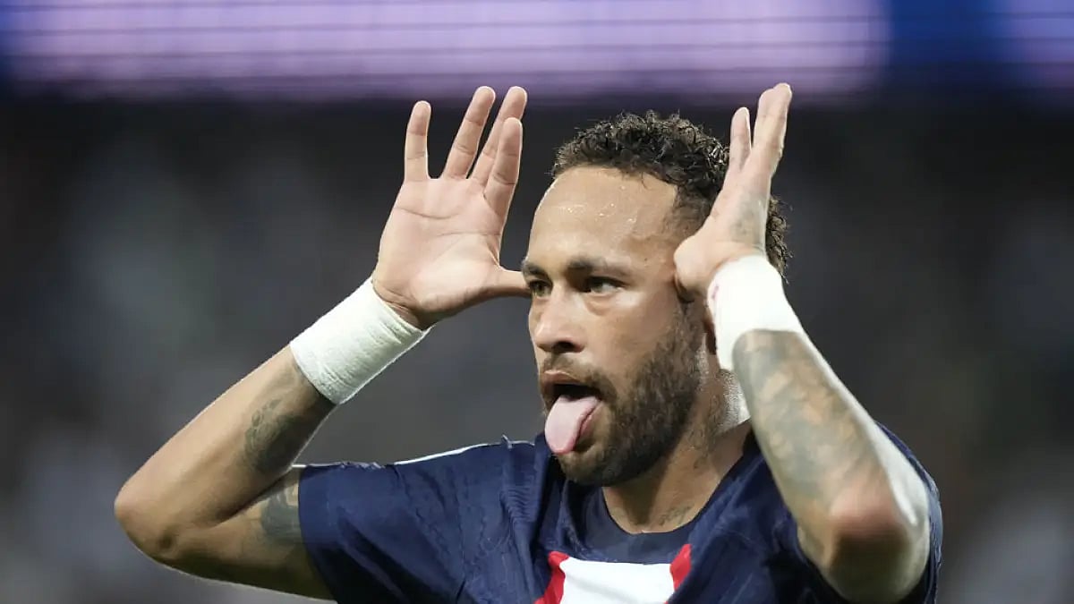 PSG's Neymar celebrates a goal against Montpellier during their Ligue 1 match.