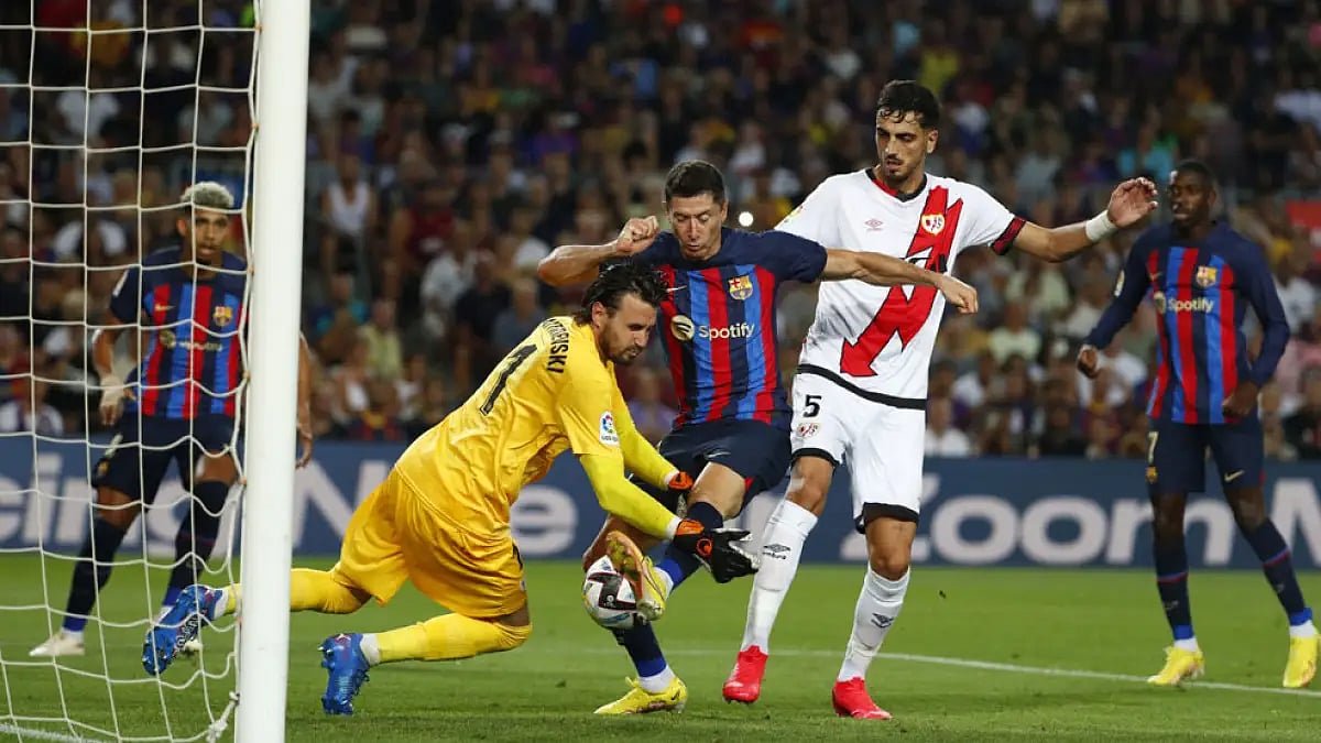 Barcelona's Robert Lewandowski, centre, in action against Rayo Vallecano at the Camp Nou.