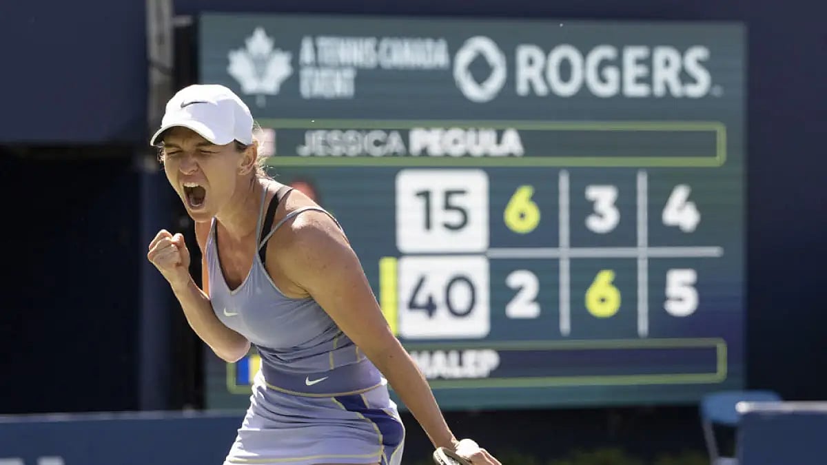Romania's Simona Halep celebrates after beating United States' Jessica Pegula.