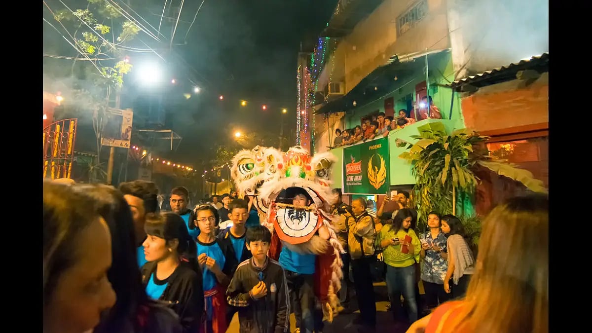 A New Year procession winds down Kolkata's Chinatown