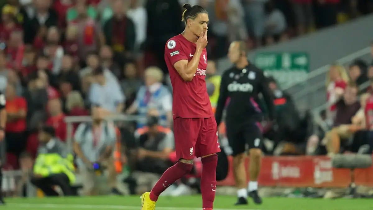 Liverpool's Darwin Nunez walks off the field after he was shown a red card against Crystal Palace.