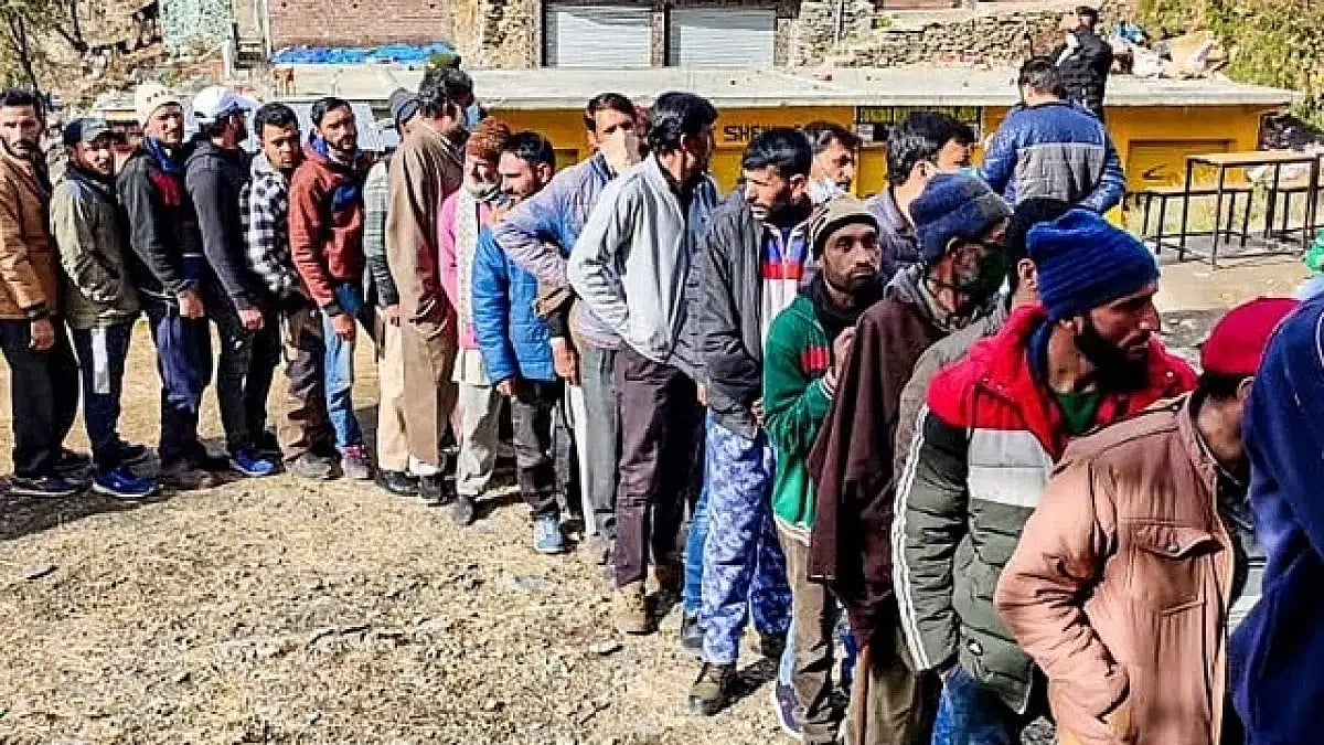 voters standing in a queue outside polling booth in J-K (Representational image)
