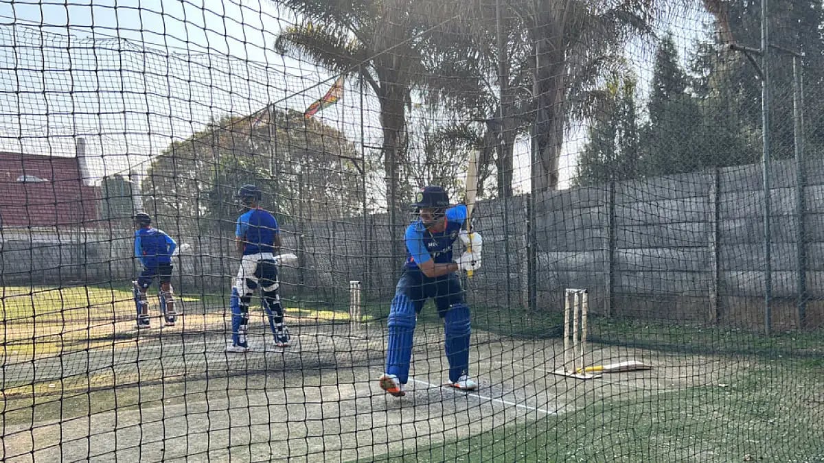 India cricketers bat during a training session in Harare.