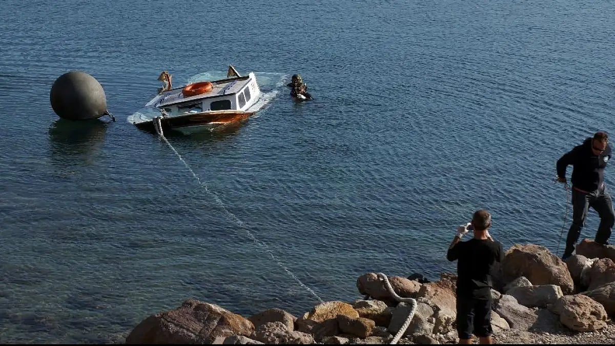 Boat with 97 migrants aground on Greek island