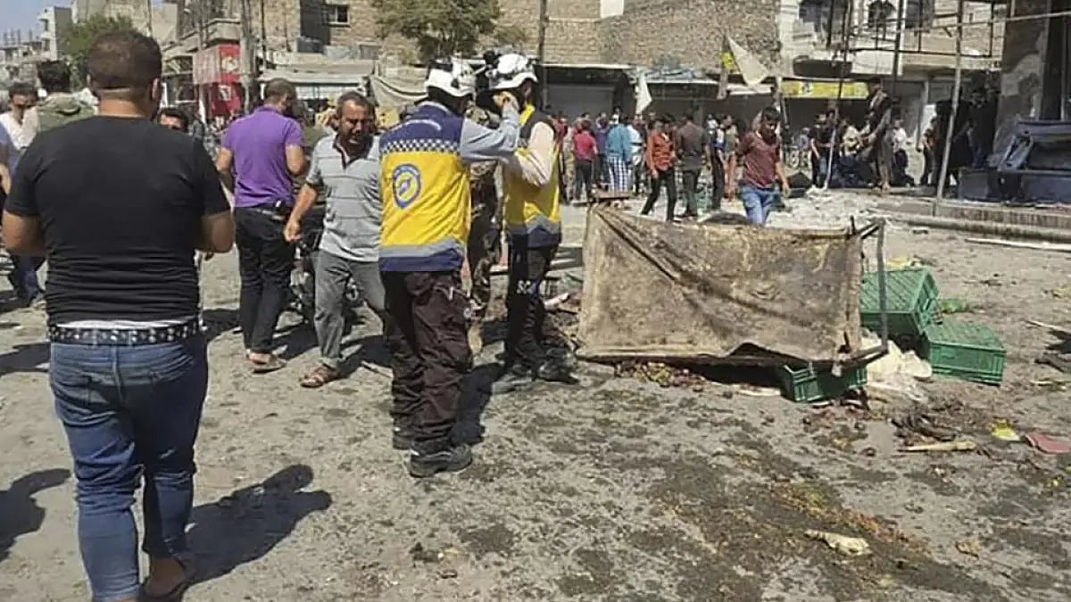 Syrian White Helmet civil defense workers in action at the rocket attacked scene, at al-Bab town, No