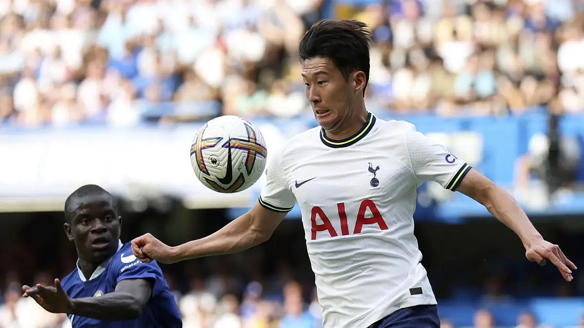 Tottenham's Son Heung-min, right, duels for the ball with Chelsea's N'Golo Kante during their English Premier League match.