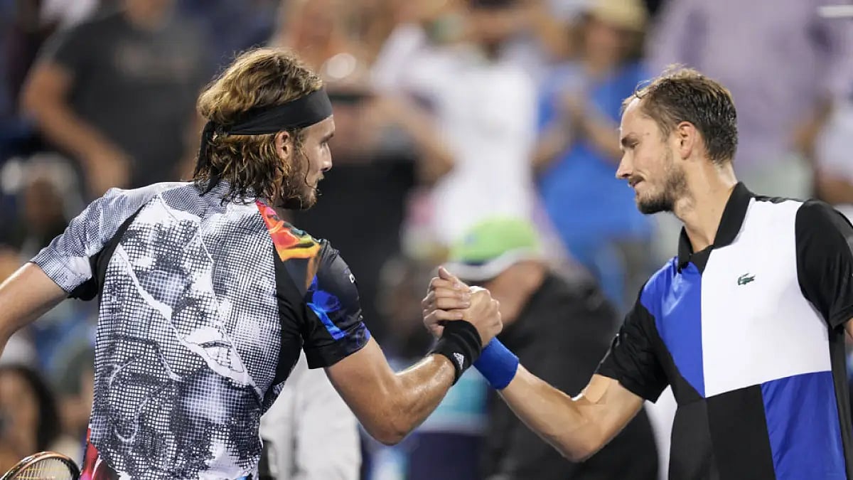 Stefanos Tsitsipas, left, and Daniil Medvedev after their semi-final match.