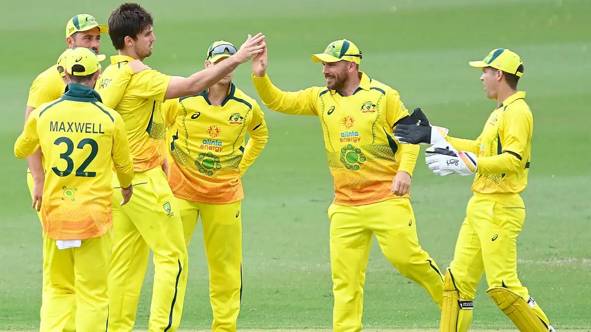 Australia players celebrate a fall of  Zimbabwean wicket in the first ODI.