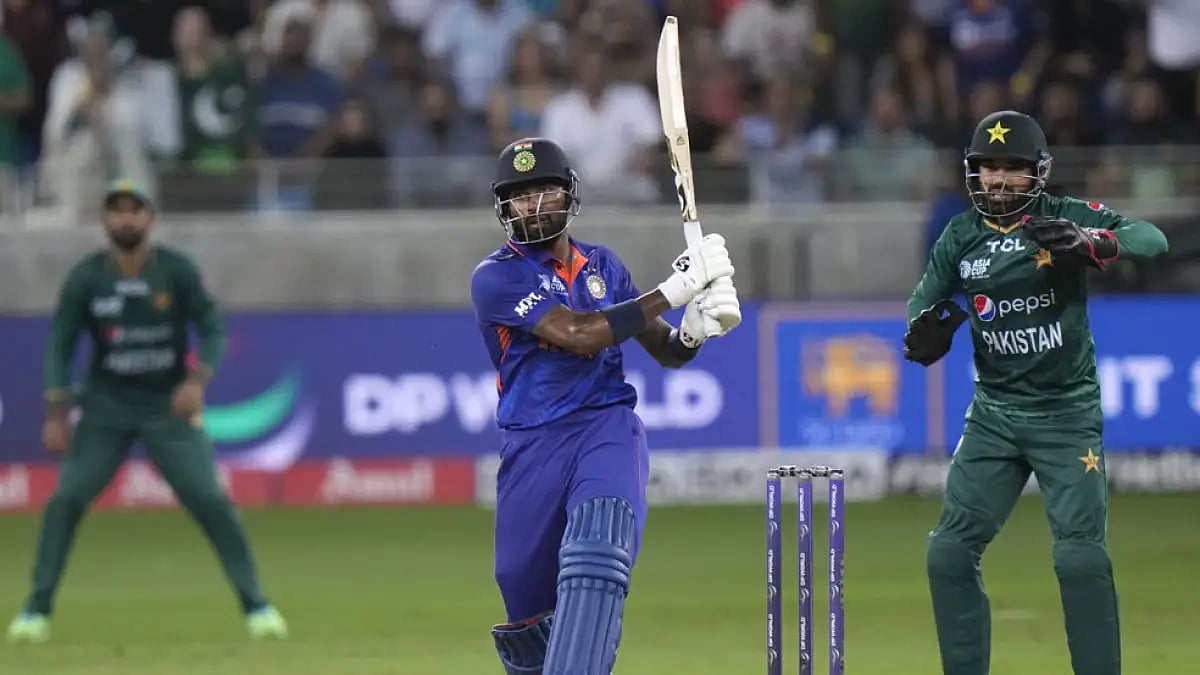 India's Hardik Pandya hits a boundary during their Asia Cup 2022 match against Pakistan. Relive the IND vs PAK match here. Photo: AP