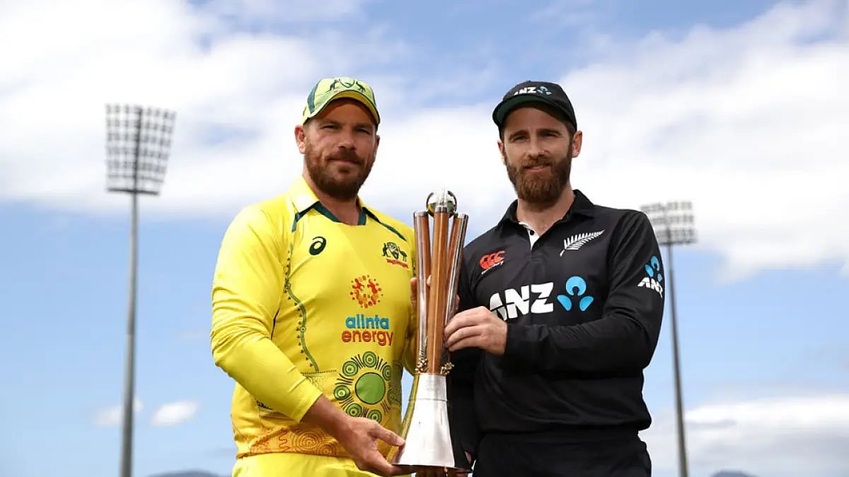 Captains Aaron Finch and Kane Williamson pose with the Chappell-Hadlee series trophy.