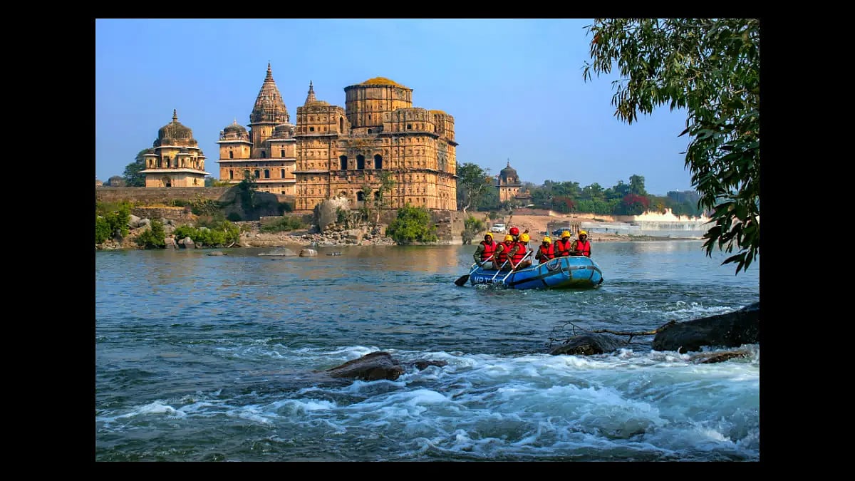 Rafting in the Betwa River with the royal cenotaphs in the background