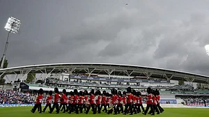 The Band of The Household Cavalry leaves at the Oval.