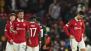 Manchester United's Cristiano Ronaldo and team mates stand dejected after defeat to Real Sociedad.