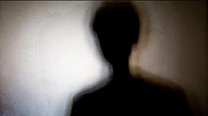 Silhouette of a boy.